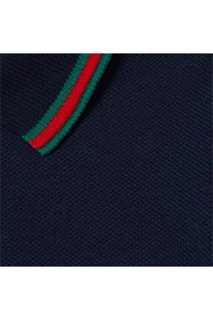 Polo in piquet di cotone elasticizzato blu scuro GUCCI KIDS | 805415XJGXV4306